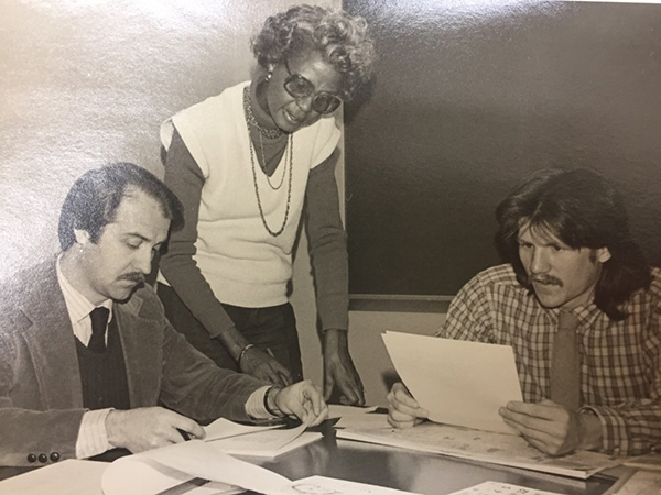 Florabelle Wilson works with Thomas Bruner and Jeff Gunderson