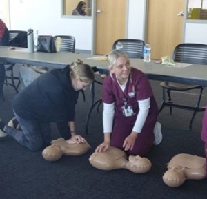 student performing CPR