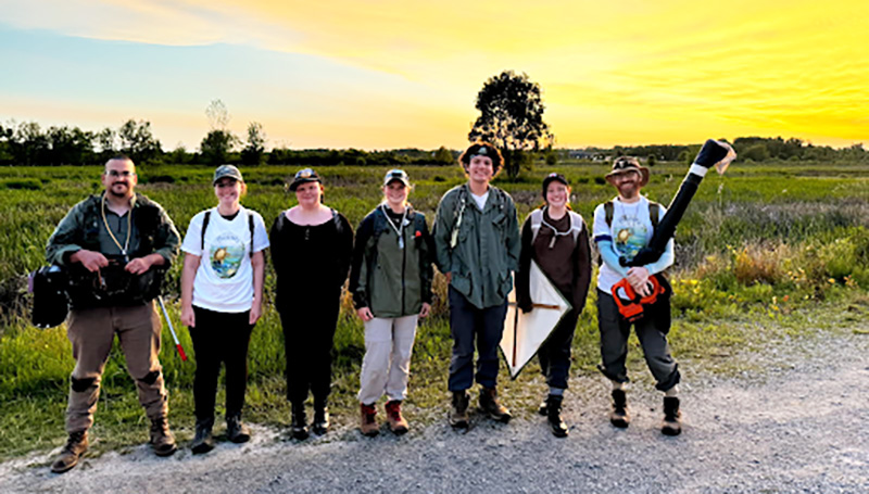 students outside in the field