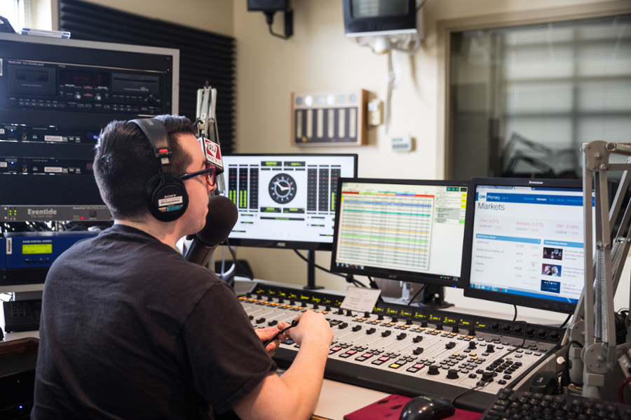 man sitting at the controls
