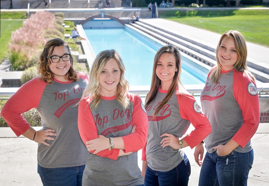 students wearing Top Dog Communication shirts
