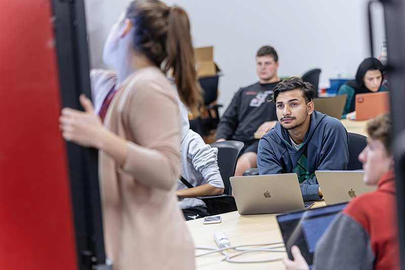 Engineering student sitting attentively in class
