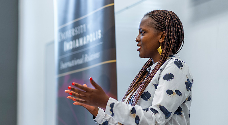 woman presenting in front of the room