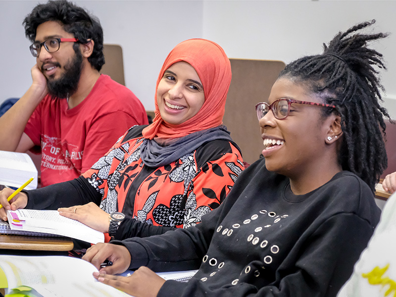 students laughing in class