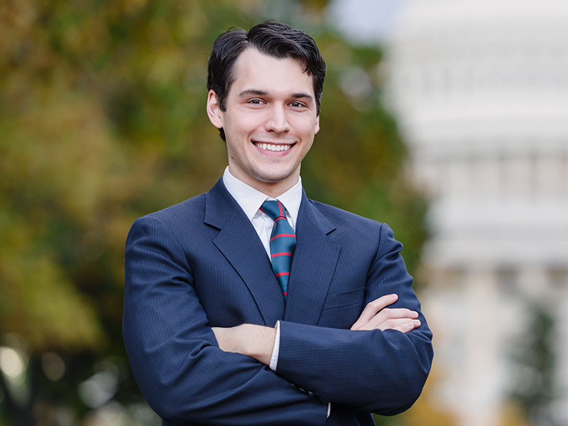 smiling young man in a business suit