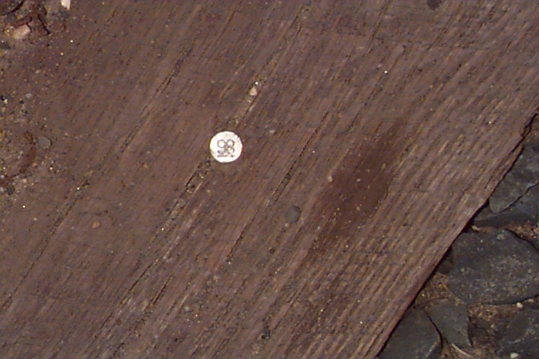 another nail head with number 98