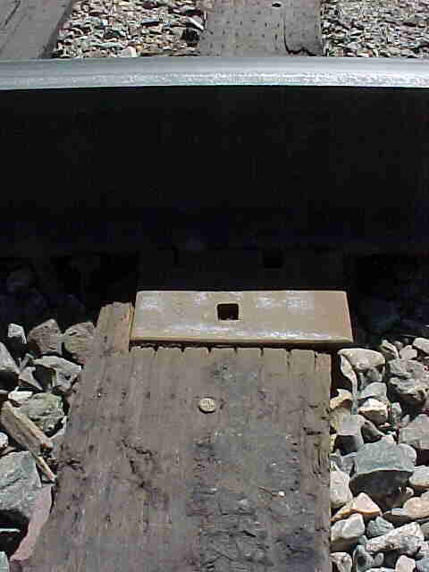 tiny nail on a railroad track