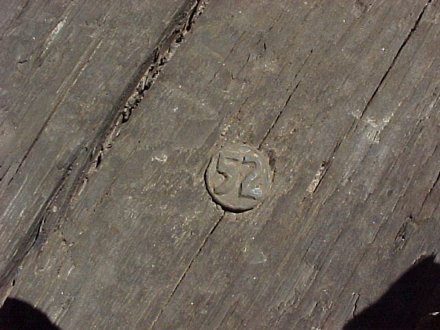 nail head with number 52 (close-up shot)