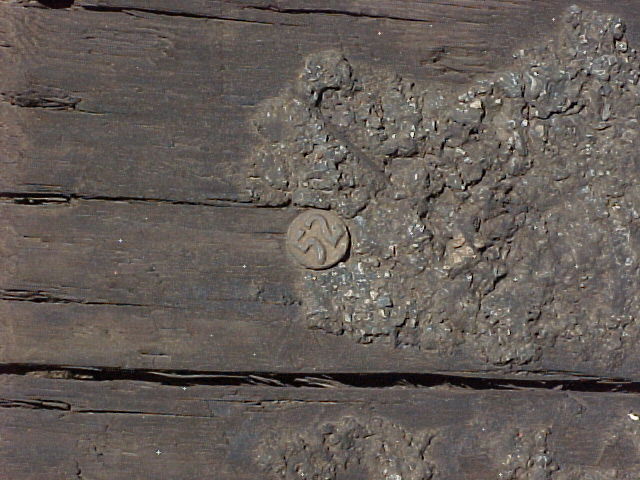 another nail head with number 52 (close-up shot)