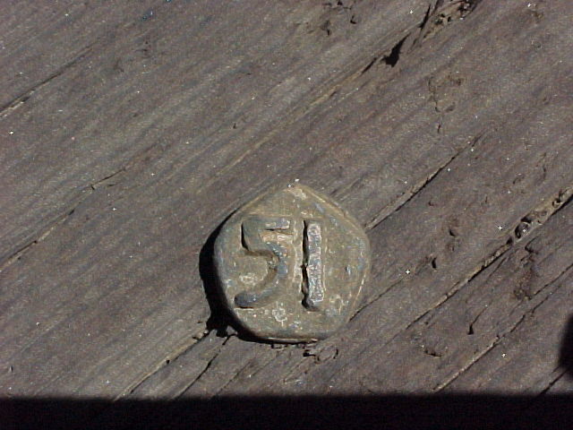 nail head with number 51 (close-up shot)