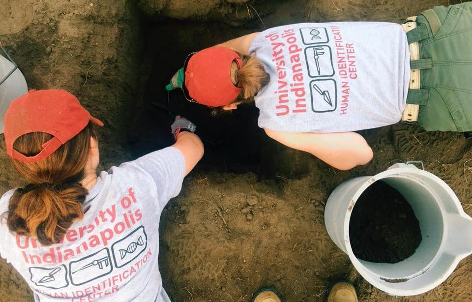 students digging