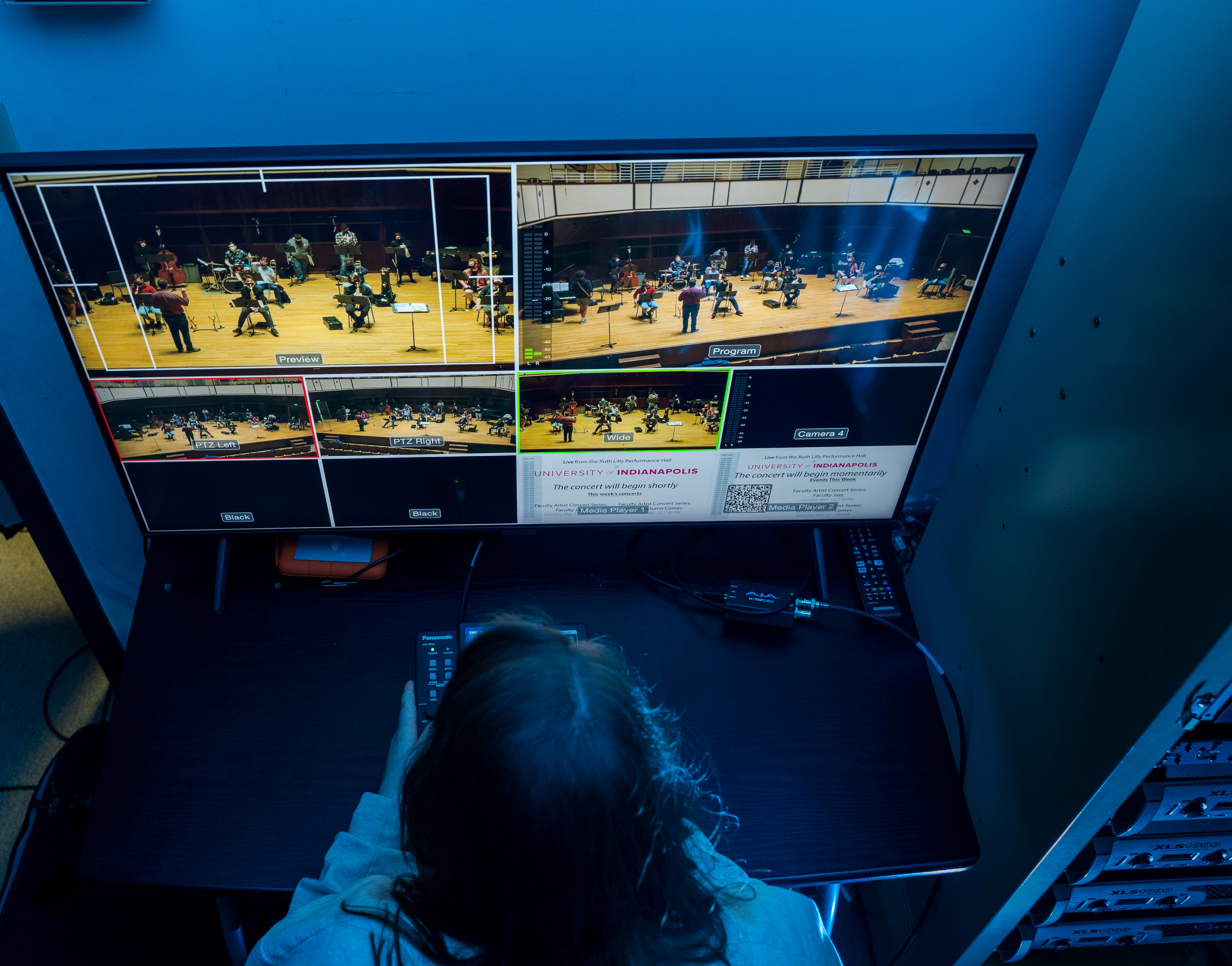 Students using music technology equipment in the studio