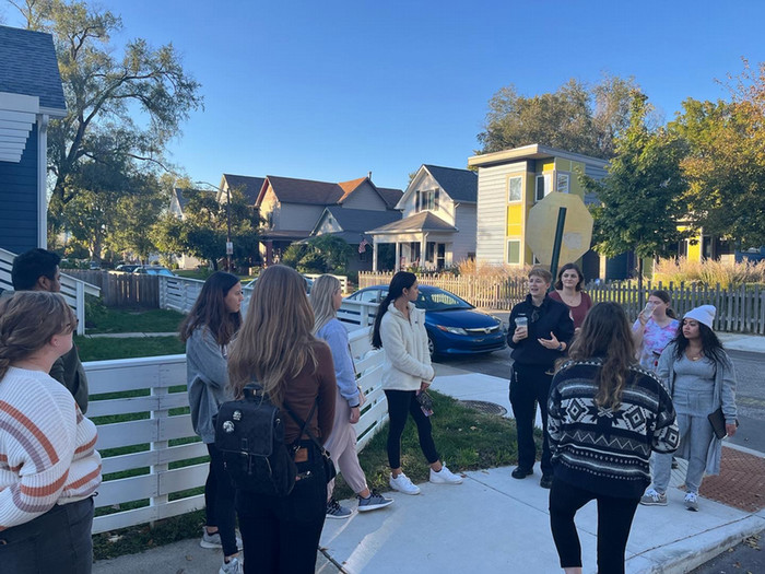 students participating in a neighborhood tour in the Fountain Square neighborhood 