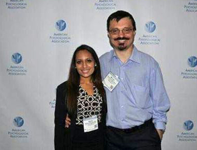 Michael Poulakis with a student