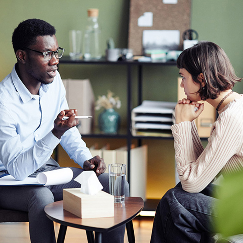 a man and woman having a discussion