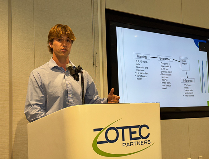 young man speaking at a podium