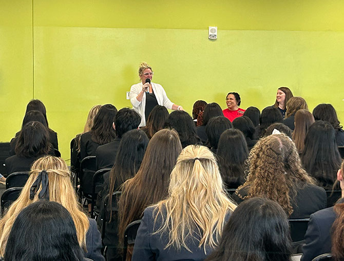 Professor speaking in front of students