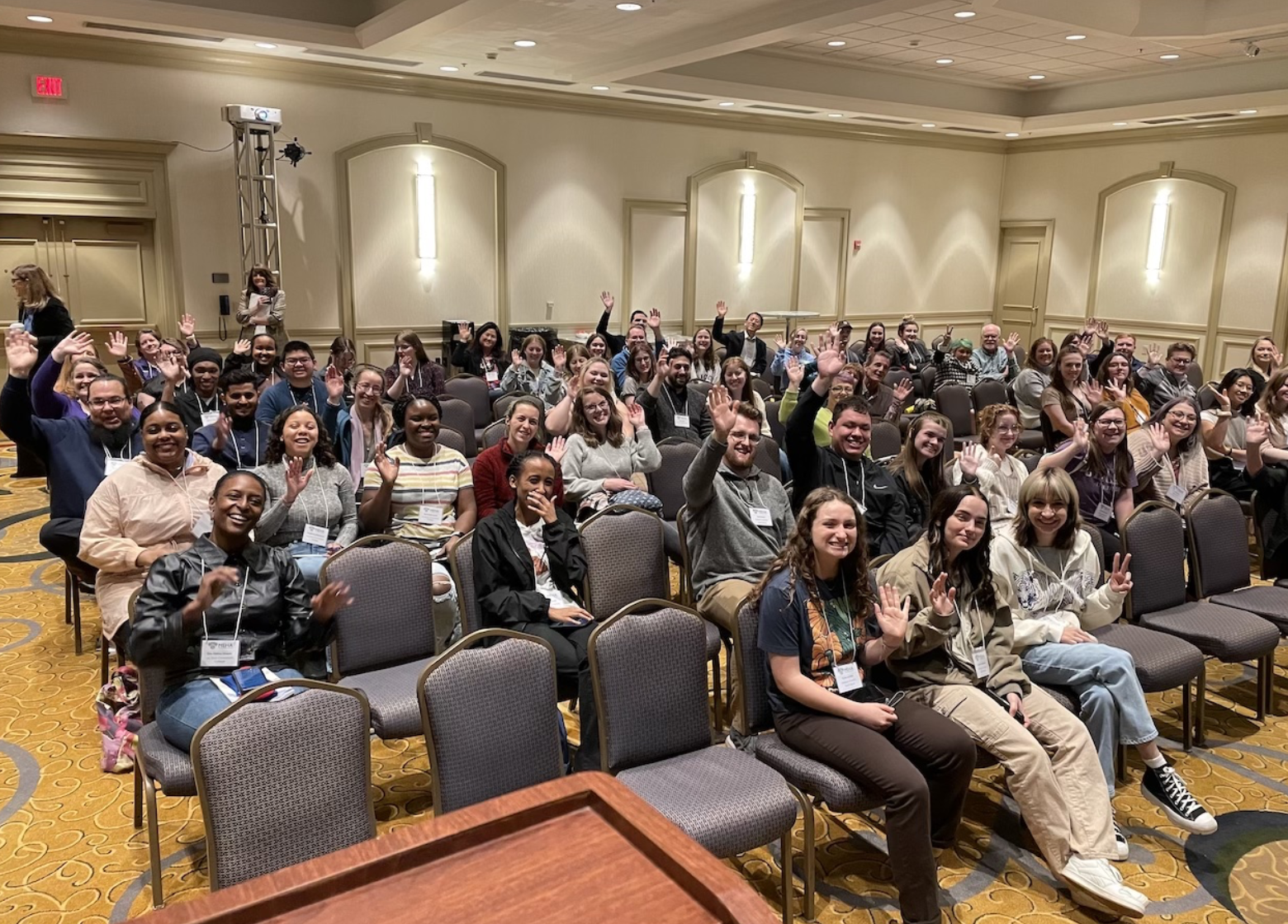 large group of student in a conference room
