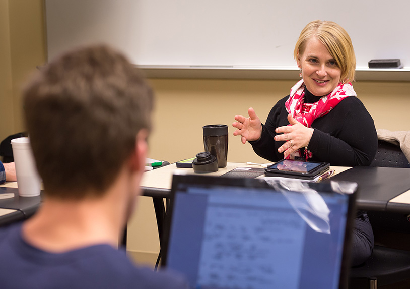 faculty talking to students