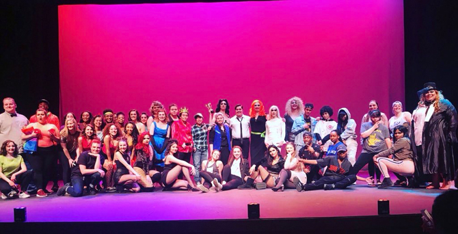 people on stage dressed in drag