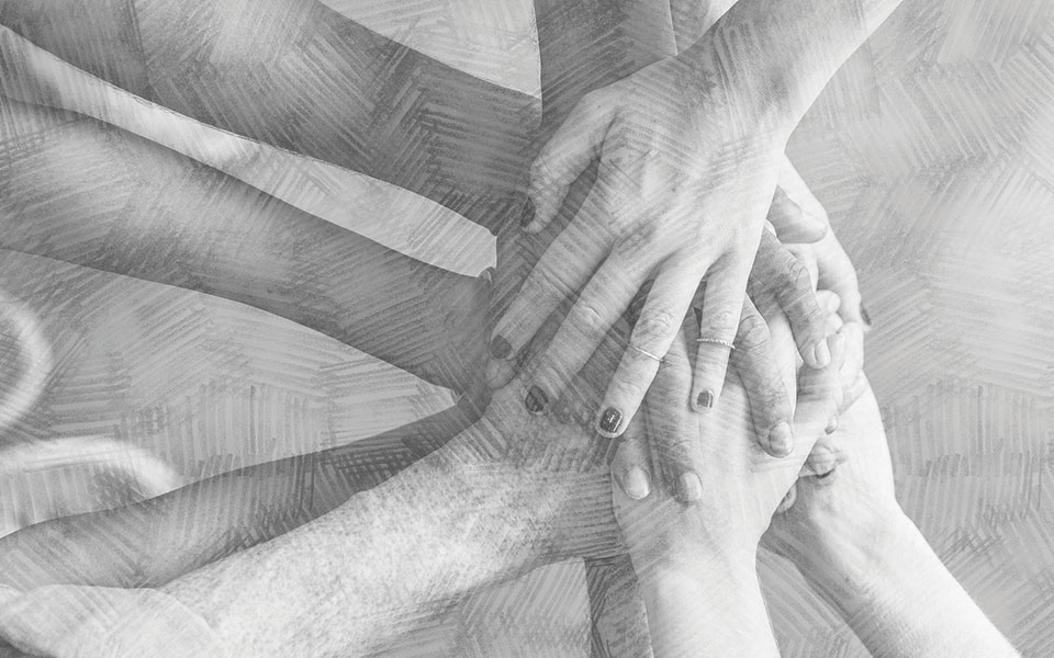 hands stacked together